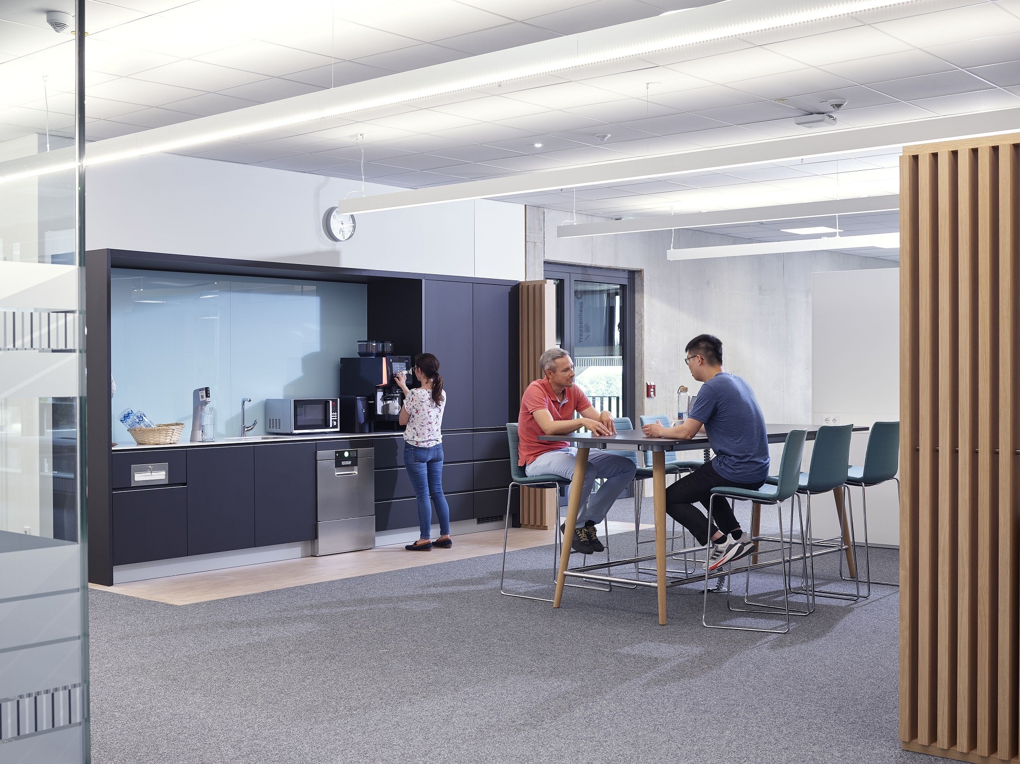 Coffee corner with three people