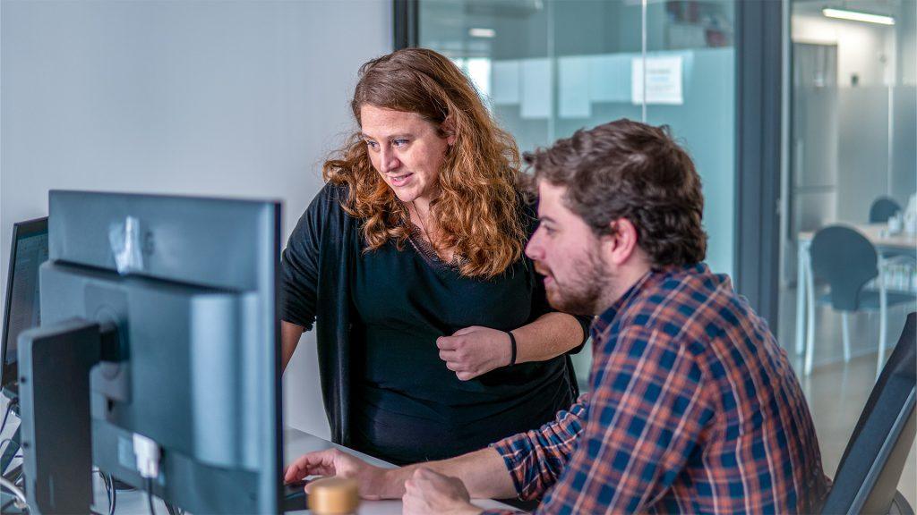 Eulalia in conversation with a colleague 
