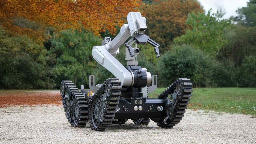 Mobile robot with gripper arm and tracks for bomb disposal or critical missions
