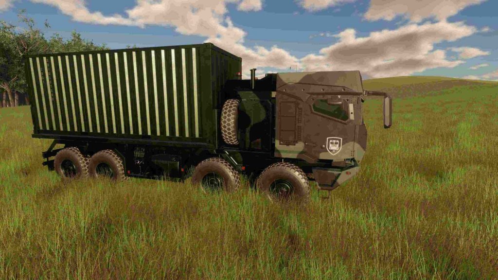 Off-road military truck with container in camouflage pattern on a grassy plain.