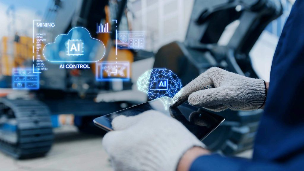 Person bedient ein Tablet vor einer Baumaschine. Digitale Overlays mit Cloud-, KI- und Analytik-Symbolen veranschaulichen den Einsatz von künstlicher Intelligenz, Datenverarbeitung und softwaredefinierten Funktionen für vernetzte Off-Highway-Fahrzeuge und Maschinen.
